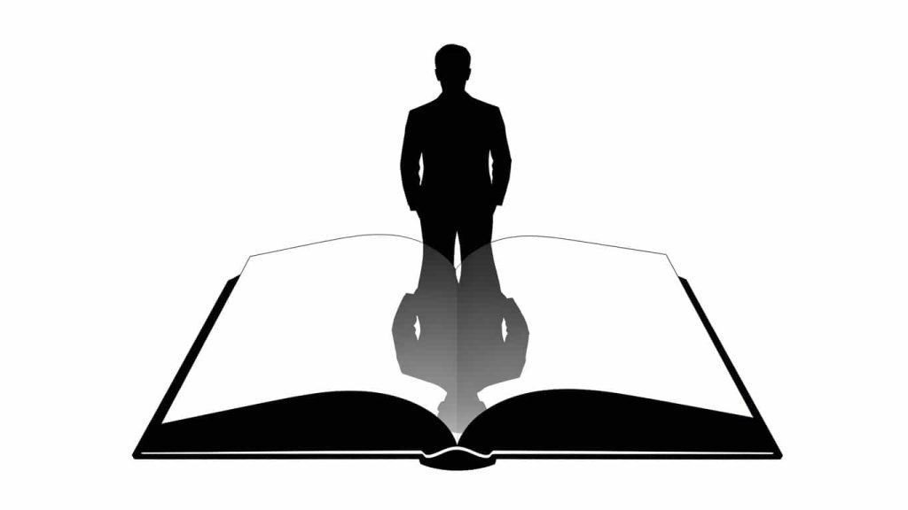 Silhouette of a book casting a duplicate human shadow to illustrate doubles in literature and film.
